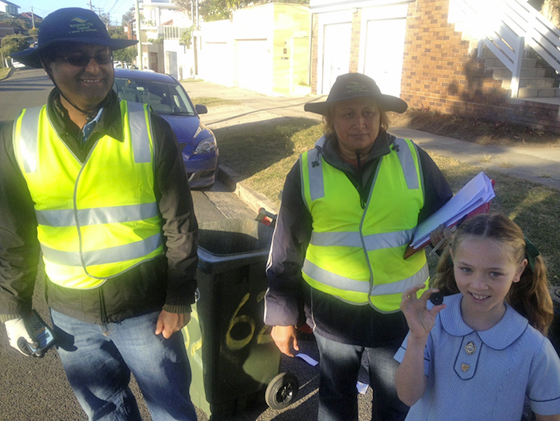 Figure: This is me holding the RFID chip with my friendly local Randwick Council workers